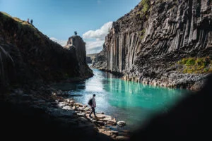 Basalt columns lining the river at Stuðlagil Canyon