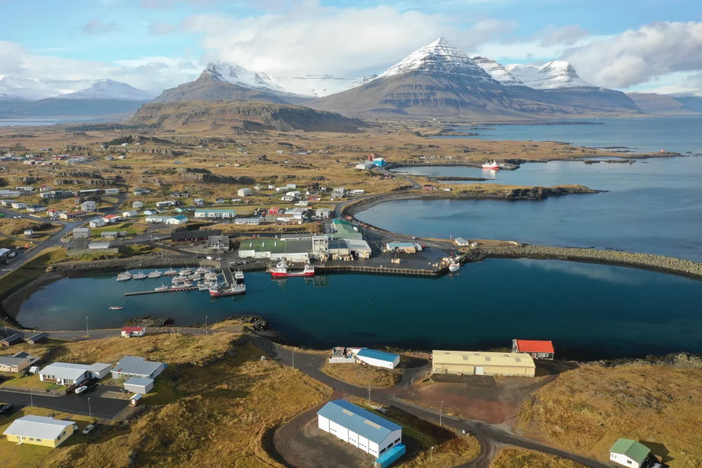 Aerial view of Djúpivogur, its harbour and surrounding mountains