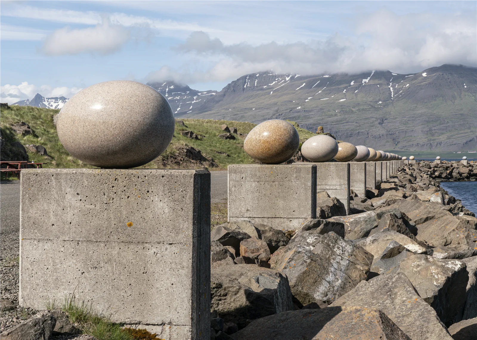 Stone egg sculptures along the waterfront in Djúpivogur