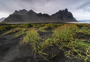 Vestrahorn rising above black sand dunes at Stokksnes